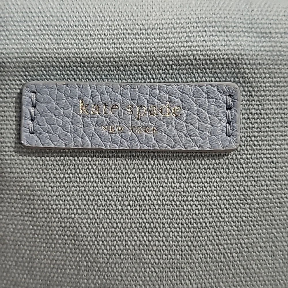 KATE SPADE COSMETIC BAG EUC